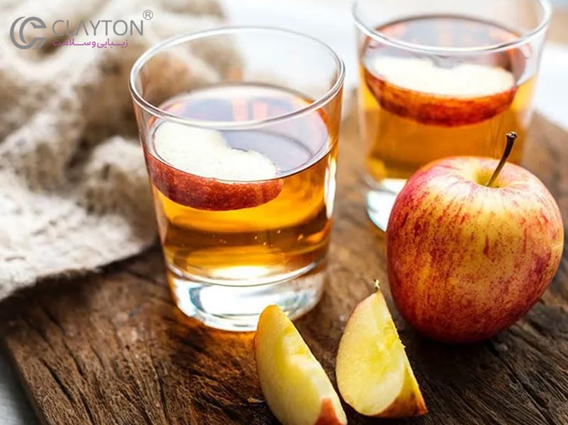 ظرف ترکیب سرکه سیب و مواد طبیعی